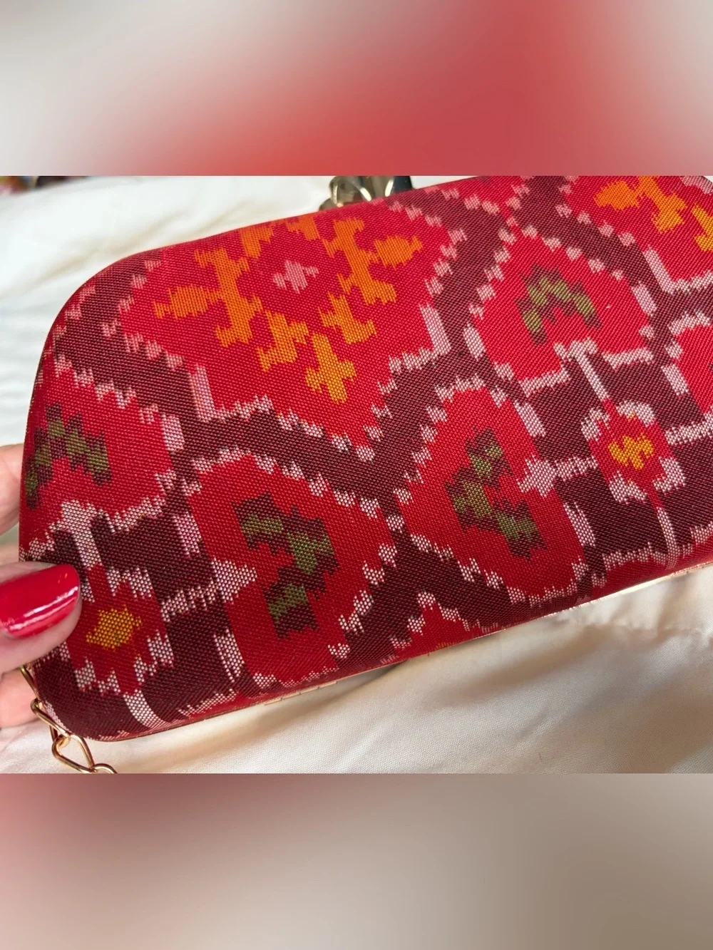 Red Patterned Evening Clutch with Gold Hardware and shoulder chain strap include